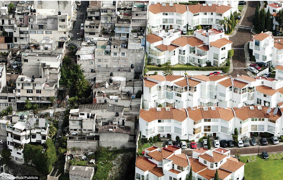 In Mexico, slums sit shoulder-to-shoulder with luxury homes; this photo has not been digitally modified. By Oscar Ruiz/Publicis, via the Daily Mail.