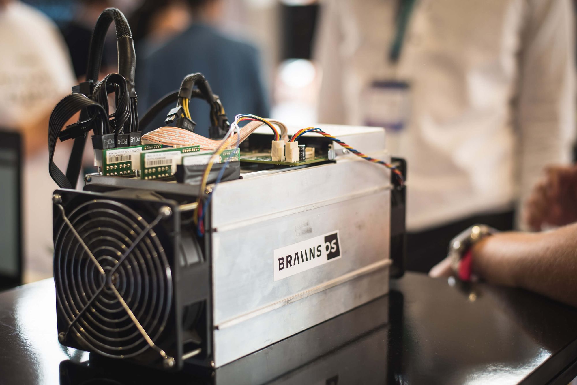 A single Antminer S9, manufactured by Bitmain, is small enough to fit in one's home. By Braiins.